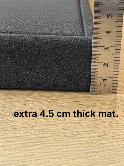 4.5cm thick dark gray memory foam mat with ruler showing thickness
