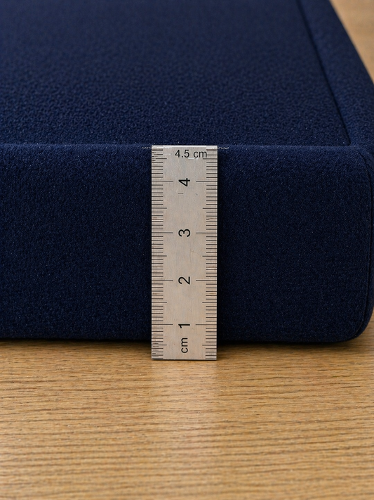 navy blue extra thick 4.5cm memory foam mat with ruler showing thickness on wooden floor